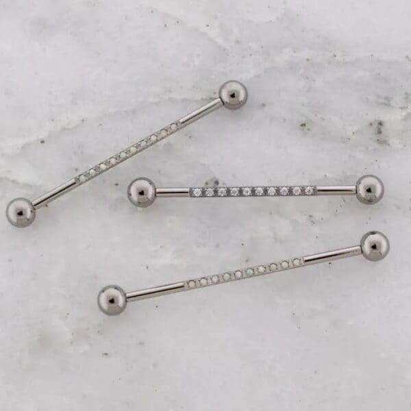 14g titanium internally threaded industrial barbell w/ cubic zirconia or opal bar
